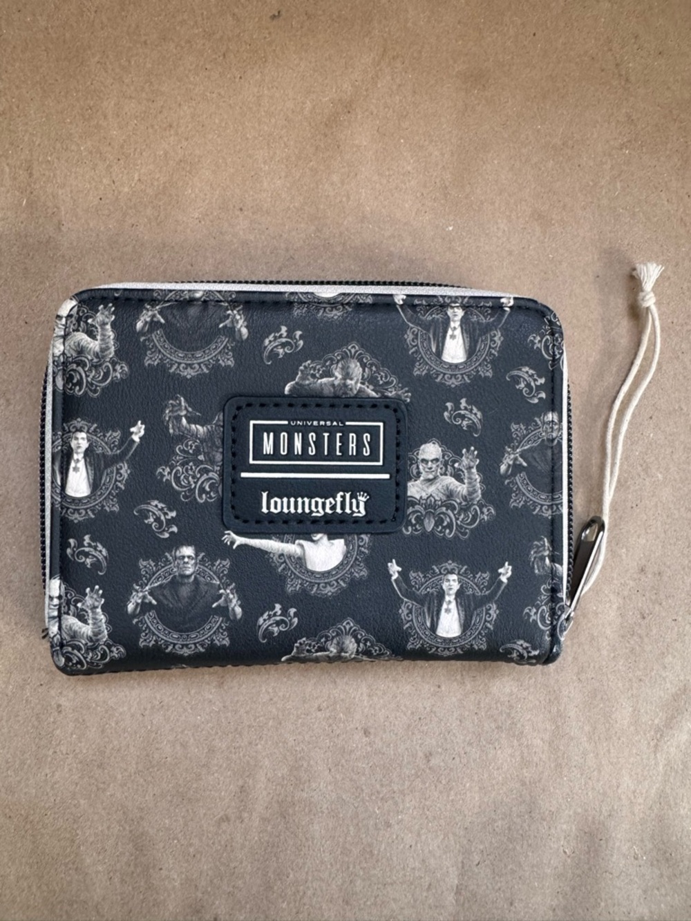 Loungefly Universal Monsters Sepia Mini Zipper Wallet. 5” by 4” by 1”